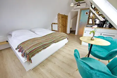 Ein Bett oder Betten in einem Zimmer der Unterkunft Zinsers Appartements im Flämmle