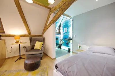 Ein Bett oder Betten in einem Zimmer der Unterkunft Zinsers Appartements im Flämmle