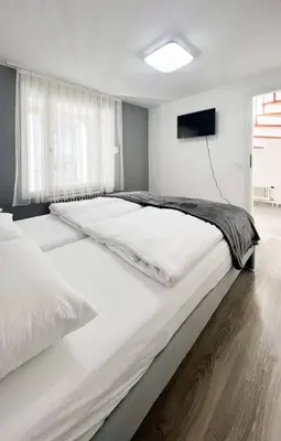 Ein Bett oder Betten in einem Zimmer der Unterkunft Schickes Apartment in City Lage B7