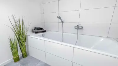 Ein Badezimmer in der Unterkunft Houses in Gau-Bischofsheim