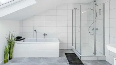 Ein Badezimmer in der Unterkunft Houses in Gau-Bischofsheim