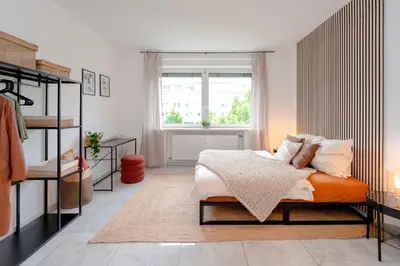 Ein Bett oder Betten in einem Zimmer der Unterkunft Travelers Dream Heart of Mannheim