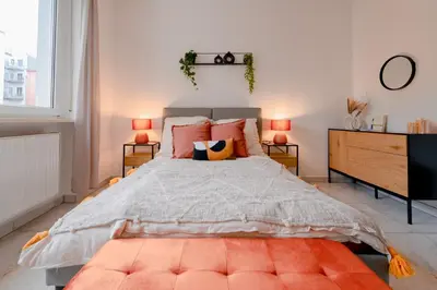 Ein Bett oder Betten in einem Zimmer der Unterkunft Travelers Dream Heart of Mannheim