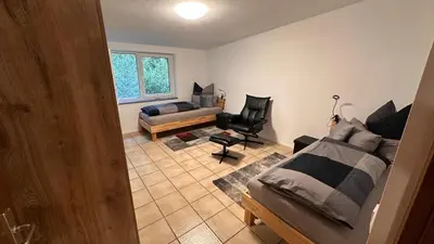Ein Bett oder Betten in einem Zimmer der Unterkunft FeWo&MoWo Zur Mühle Reinhard