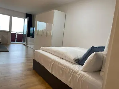 Ein Bett oder Betten in einem Zimmer der Unterkunft 1-Zimmerapartment mit Burgblick