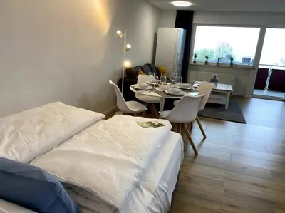 Ein Bett oder Betten in einem Zimmer der Unterkunft 1-Zimmerapartment mit Burgblick