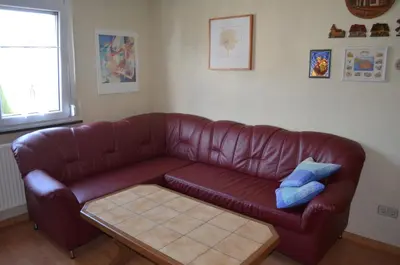 Ein Sitzbereich in der Unterkunft Ferienwohnung Am Neuberg