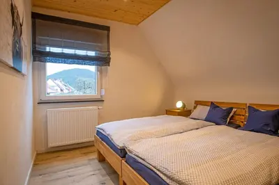 Ein Bett oder Betten in einem Zimmer der Unterkunft Zum Henner