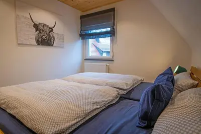 Ein Bett oder Betten in einem Zimmer der Unterkunft Zum Henner