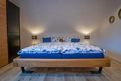 Ein Bett oder Betten in einem Zimmer der Unterkunft Zum Henner