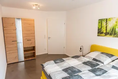 Ein Bett oder Betten in einem Zimmer der Unterkunft Ferienwohnung am Erzberg