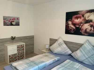 Ein Bett oder Betten in einem Zimmer der Unterkunft Ferienwohnungen Bella Vita