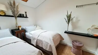 Ein Bett oder Betten in einem Zimmer der Unterkunft Ferienwohnungen Krüger 'Apartment Luke'