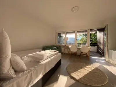 Ein Bett oder Betten in einem Zimmer der Unterkunft Kaffeehof 2 - FeWo in ruhiger Aussichtslage