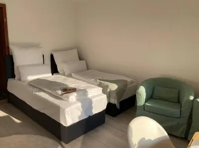 Ein Bett oder Betten in einem Zimmer der Unterkunft Kaffeehof 2 - FeWo in ruhiger Aussichtslage
