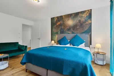 Ein Bett oder Betten in einem Zimmer der Unterkunft Lit Living - Luxury House - Box Spring - Parking - Exclusive Kitchen