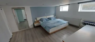 Ein Bett oder Betten in einem Zimmer der Unterkunft Traumblick Südpfalz