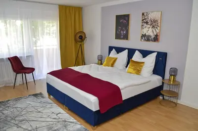 Ein Bett oder Betten in einem Zimmer der Unterkunft M&D Apartments nähe Volkspark mit Balkon - Netflix - Küche