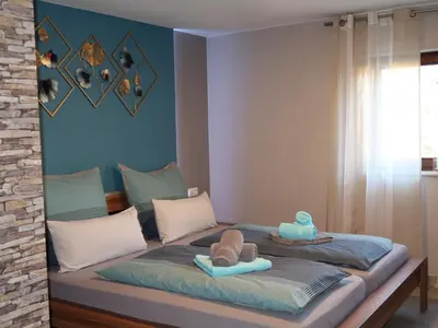 Ein Bett oder Betten in einem Zimmer der Unterkunft Apartment Hartmann im Odenwald by Interhome