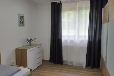 Ein Bett oder Betten in einem Zimmer der Unterkunft Ferienwohnung Schmidt
