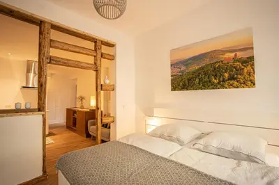 Ein Bett oder Betten in einem Zimmer der Unterkunft Klein aber Fein