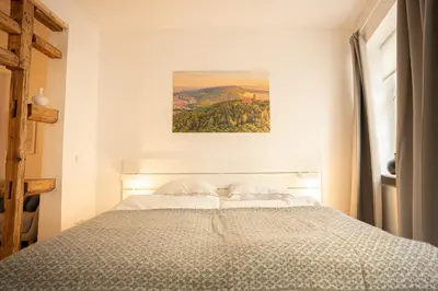 Ein Bett oder Betten in einem Zimmer der Unterkunft Klein aber Fein