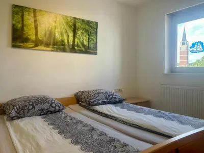 Ein Bett oder Betten in einem Zimmer der Unterkunft Goldstadt Panorama Suite - City Aparament Pforzheim