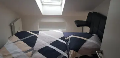 Ein Bett oder Betten in einem Zimmer der Unterkunft Joanna Apartment - Schwetzingen 3