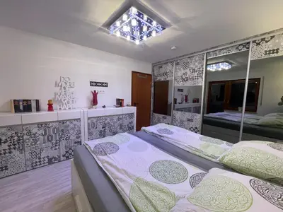 Ein Bett oder Betten in einem Zimmer der Unterkunft Goldstadt Garden Residence - City Apartment Pforzheim