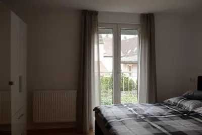 Ein Bett oder Betten in einem Zimmer der Unterkunft Wohnung Nr. 2 - 2,5 Zimmer Obergeschoss Wohnung