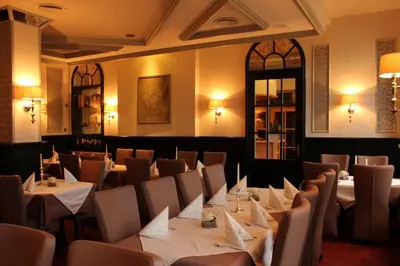 Ein Restaurant oder anderes Speiselokal in der Unterkunft Hotel Bronnbacher Hof