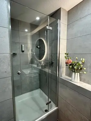 Ein Badezimmer in der Unterkunft Hotel Bronnbacher Hof