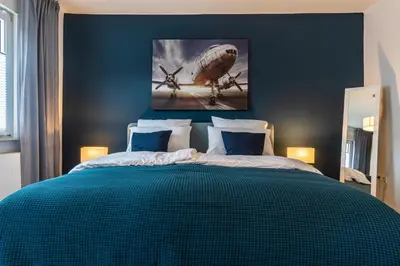Ein Bett oder Betten in einem Zimmer der Unterkunft RELAX-Apartment - Sauna & Spacious, Garage, 105 m2