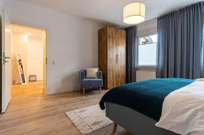 Ein Bett oder Betten in einem Zimmer der Unterkunft RELAX-Apartment - Sauna & Spacious, Garage, 105 m2
