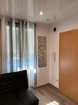 Ein Sitzbereich in der Unterkunft KRAICHGAU # 2-ZKD mit EBK, WLAN, Monteurzimmer, SELF-CHECK-IN
