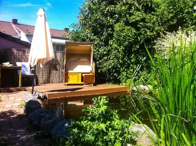 Ein Garten an der Unterkunft Herzensort - idyllisches Gästehaus für 2 im Garten