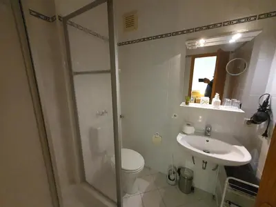 Ein Badezimmer in der Unterkunft ABM Apartment Haus