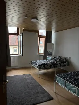 Ein Bett oder Betten in einem Zimmer der Unterkunft 1 Zimmer für 2 Personen Bruchsal ruhige Lage