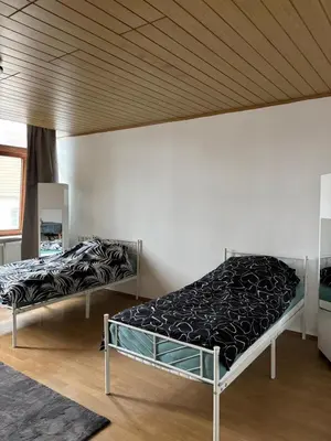 Ein Bett oder Betten in einem Zimmer der Unterkunft 1 Zimmer für 2 Personen Bruchsal ruhige Lage