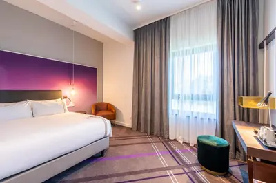 Ein Bett oder Betten in einem Zimmer der Unterkunft Premier Inn Heidelberg City Bahnstadt