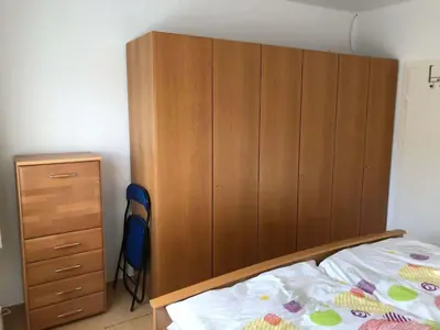 Ein Bett oder Betten in einem Zimmer der Unterkunft Gästehaus Lützelbach
