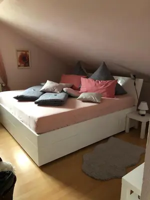 Ein Bett oder Betten in einem Zimmer der Unterkunft Ferienwohnung Theresa
