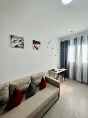 Ein Sitzbereich in der Unterkunft Neuwertiges Apartment mit schnellem WLAN, Netflix, Glasfaser, Kostenlose Privatparkplatz auch für Transporter geeignet R20