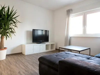 TV/Unterhaltungsangebot in der Unterkunft Wohnung Forst