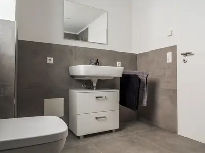 Ein Badezimmer in der Unterkunft Wohnung Forst