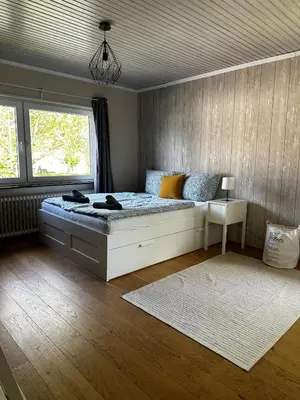 Ein Bett oder Betten in einem Zimmer der Unterkunft Gemütliche Wohnung Karlsruhe