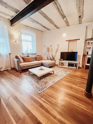 Ein Sitzbereich in der Unterkunft Ferienwohnung in maison de grès