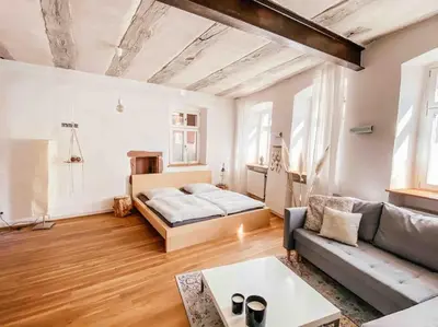Ein Bett oder Betten in einem Zimmer der Unterkunft Ferienwohnung in maison de grès
