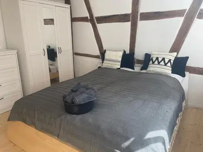 Ein Bett oder Betten in einem Zimmer der Unterkunft GetAway in Eberbach im Odenwald nahe Heidelberg