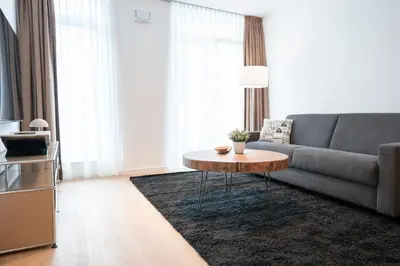 Ein Sitzbereich in der Unterkunft SCHÖNTALHAUS City Apartments